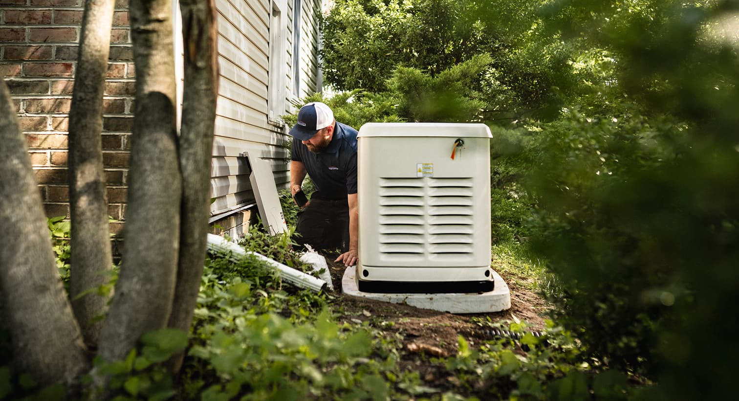 A professional Horizon technician inspects a large, beige whole-home standby generator installed on a concrete pad outside a residential house.