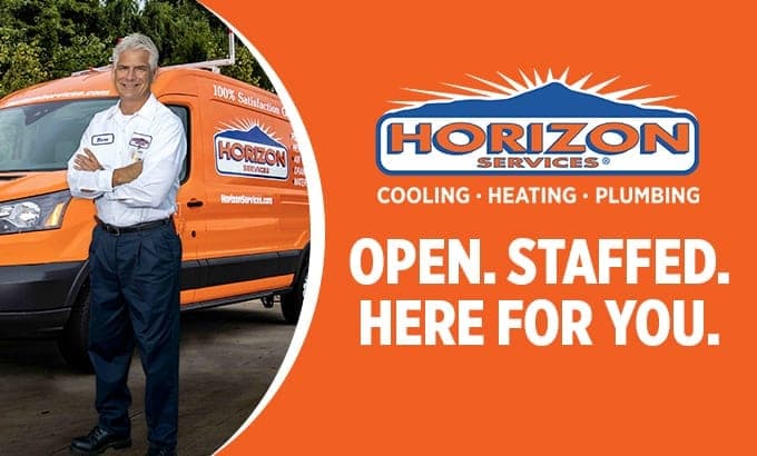 A smiling Horizon technician standing in front of his vehicle with the text 'Open. Staffed. Here For You.' on the right side of the image
